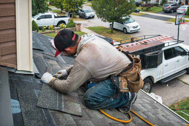 Professional Roofing technician working in Cross River, NY